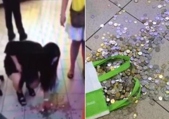 女子买iPhone被坑要退款 店员扔18斤硬币